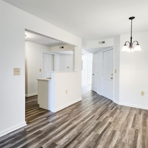 a long hallway with white walls